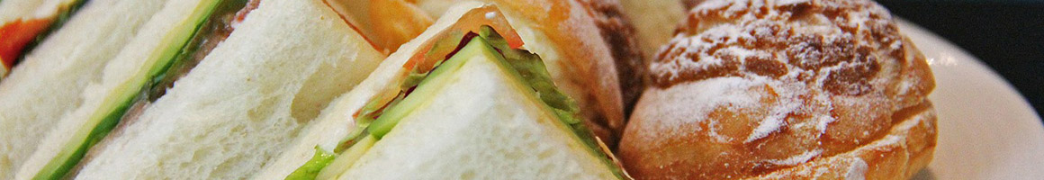 Eating Gluten-Free Sandwich at Pane Pane Sandwiches restaurant in Seattle, WA.